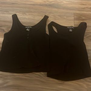 2 black tank tops